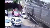 ویدئوی وحشتناک از ریزش دیوار روی چند خودرو!