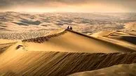 ویدئوی زیبا از نمایی دیدنی خورشید پشت ابر در صحرای کالاهاری آفریقا