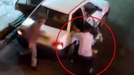 ویدئوی کتک‌کاری راننده تاکسی با زن بی‌حجاب با قفل فرمان!